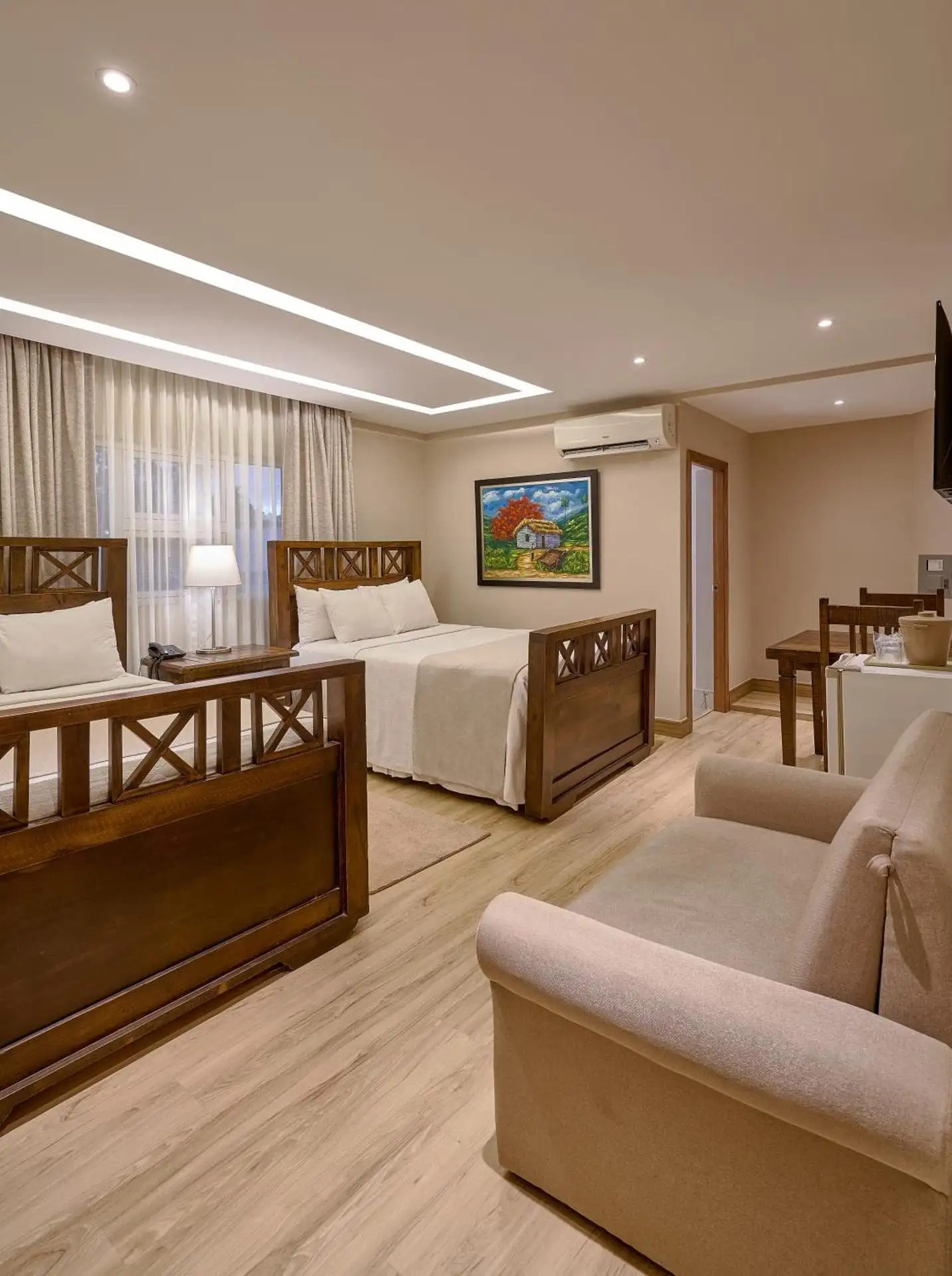 Habitación Doble con dos camas queen para familias